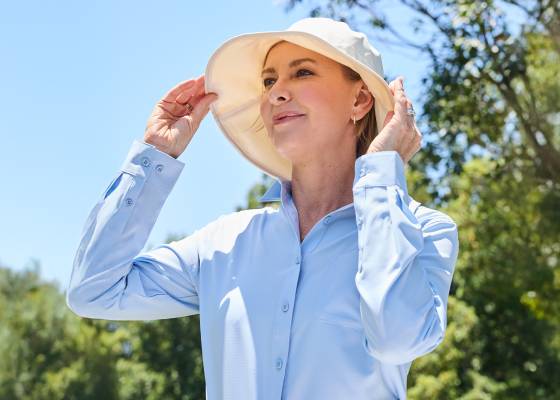 Woman wearing s UPF 50 sun hat