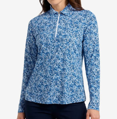 Blue and white patterned long-sleeve shirt worn by a person on a white background